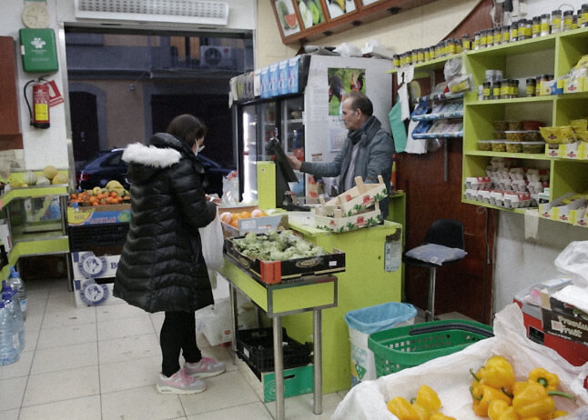 Iman purchasing items at a store